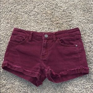 Cuffed RSQ Burgundy Raw Edge Jean Shorts.